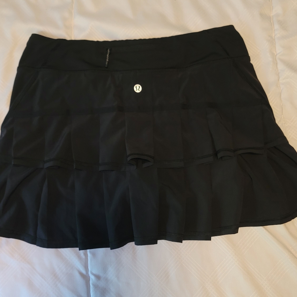 Lululemon athletic skirt with built-in shorts. Size 6. Black.